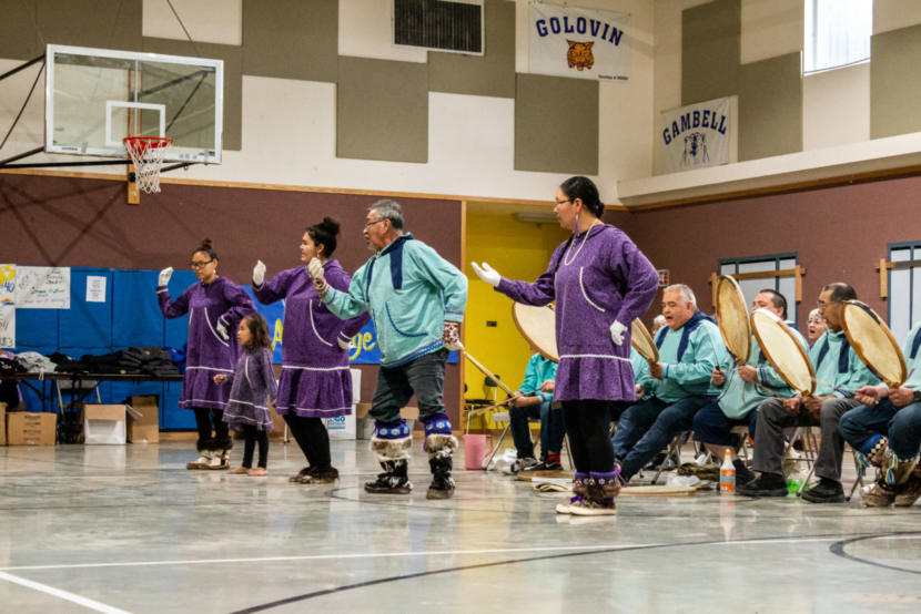 The Anchorage Kingikmiut Dancers and Singers perform at the 2019 Kingikmiut Dance Festival in Wales. (JoJo Phillips/KNOM)