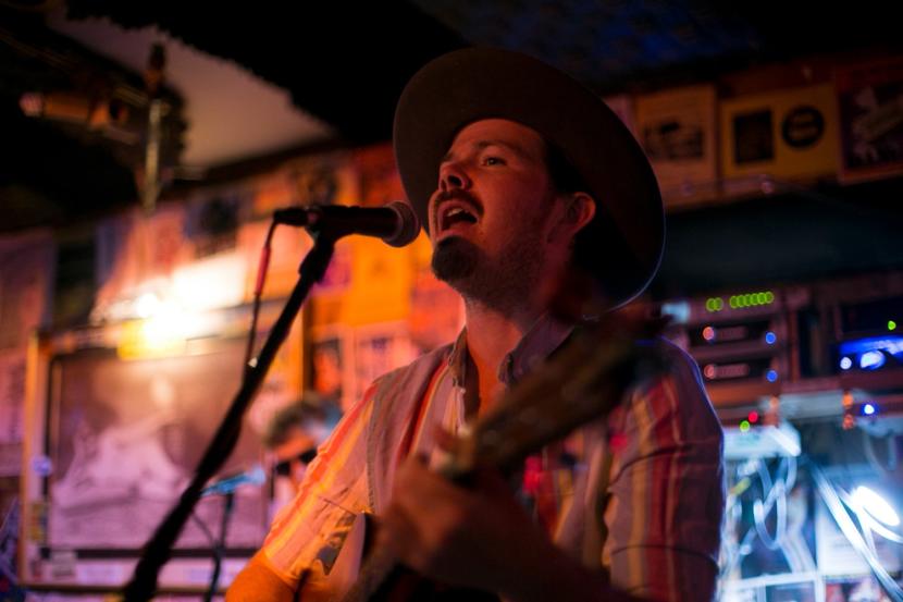 Tyson Davis plays with the band Blackwater Railroad Company, in July of 2019 in Juneau. Davis tested positive for COVID-19 in late June and is the band is asking people who attended shows in Fairbanks and Seward to get tested for the virus. (Photo courtesy Annie Bartholomew)