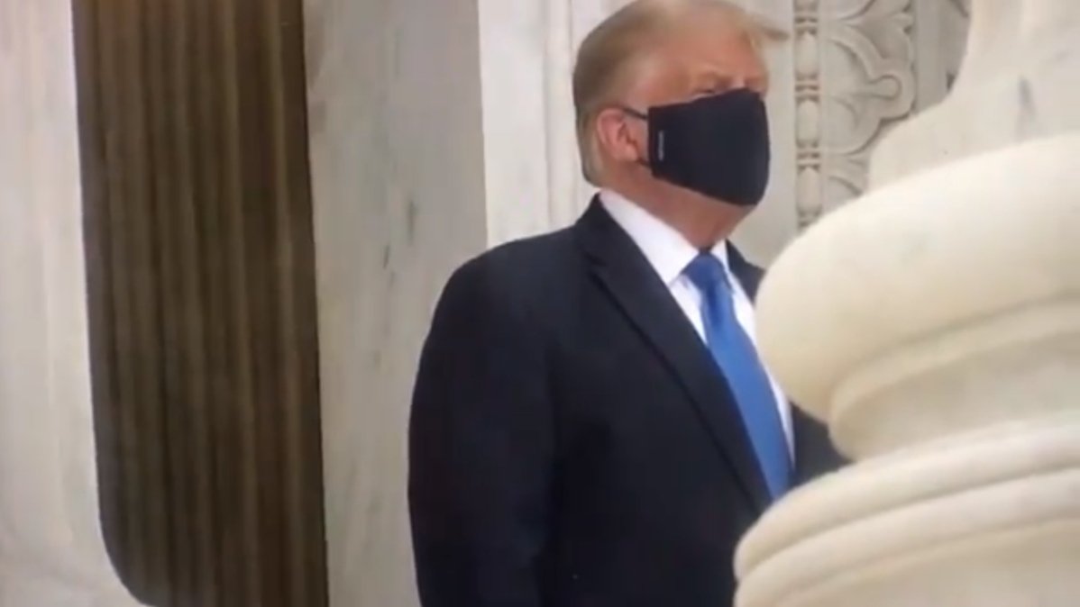 Trump abucheado funeral.jpg
