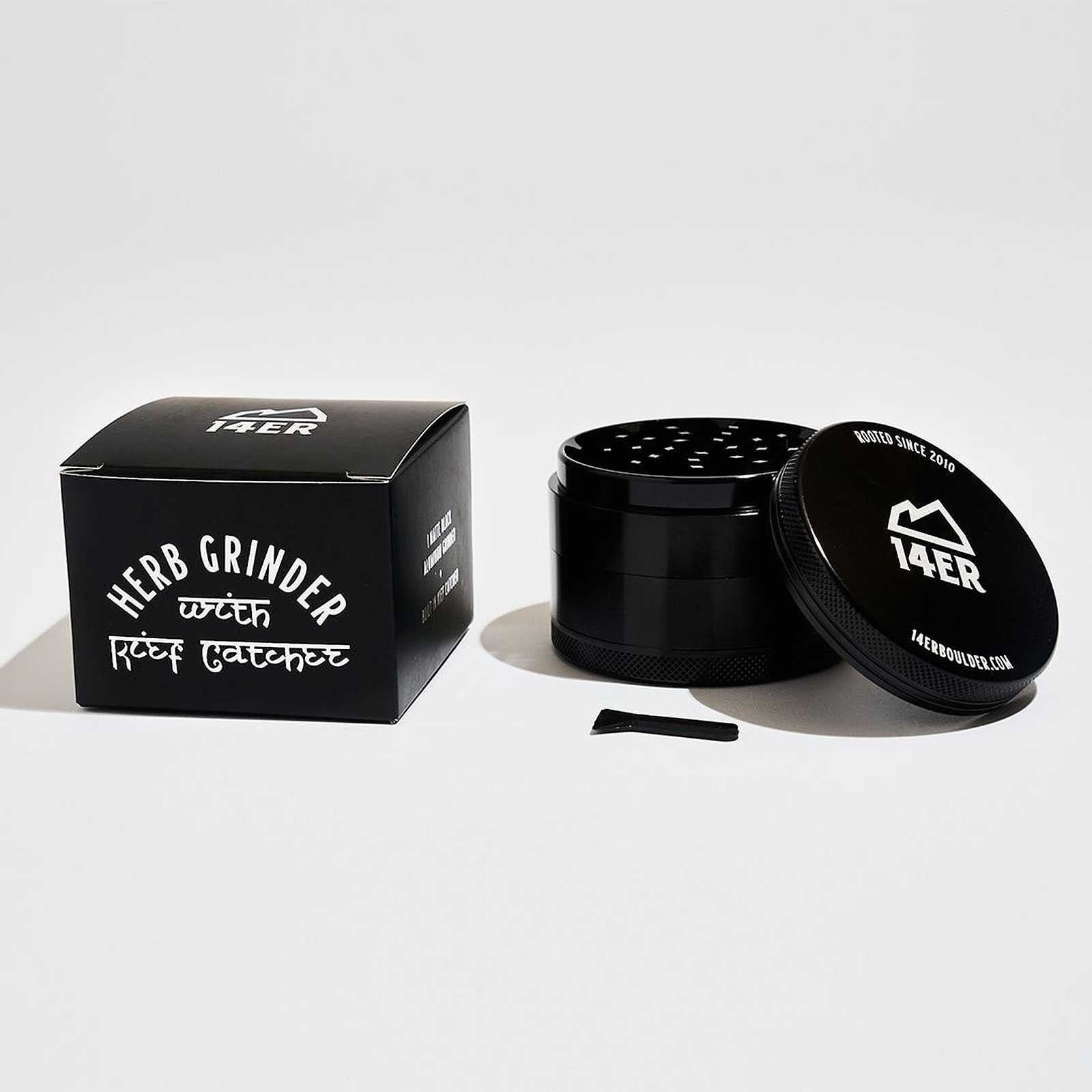 14er Black Grinder with Kief catcher Leafly