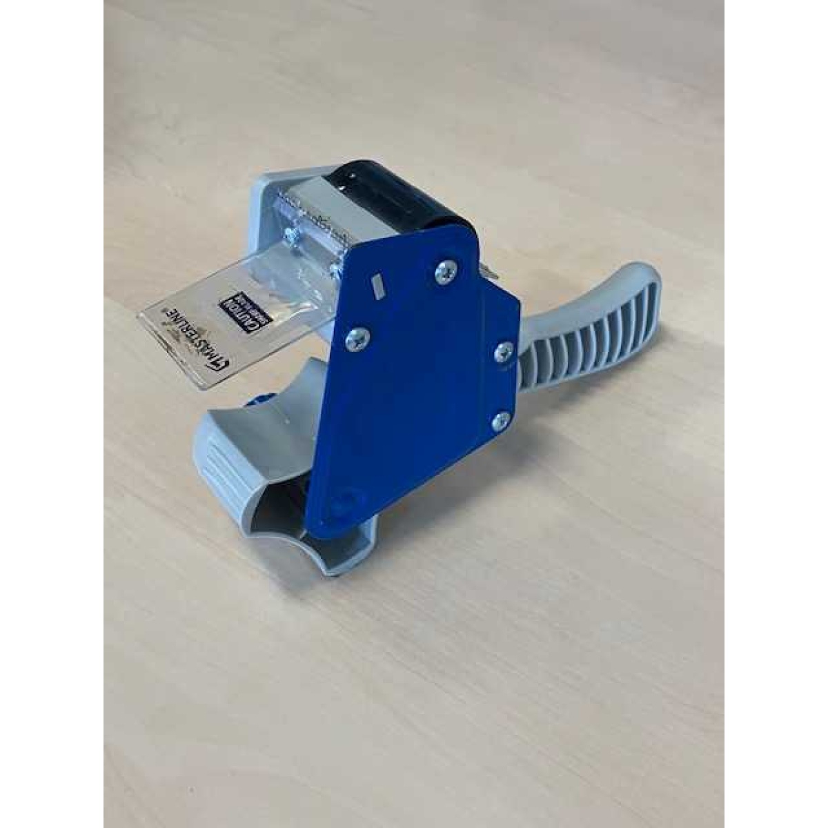 Parcel tape dispenser