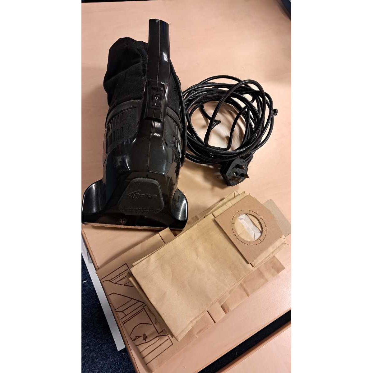 Hand-held corded Delta Dust Devil