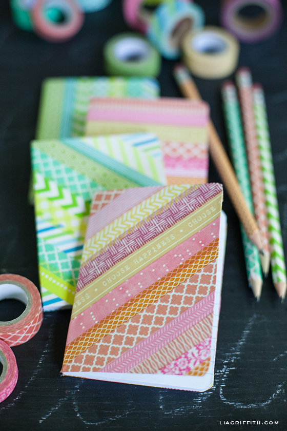 colorful patterned washi tape designed notebook covers with rolls of tape and pencils