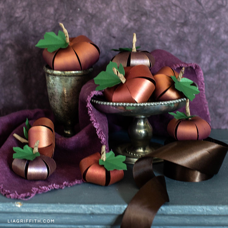 ombré paper pumpkins on mantle
