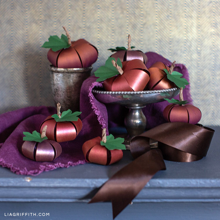 ombré paper pumpkins on mantle