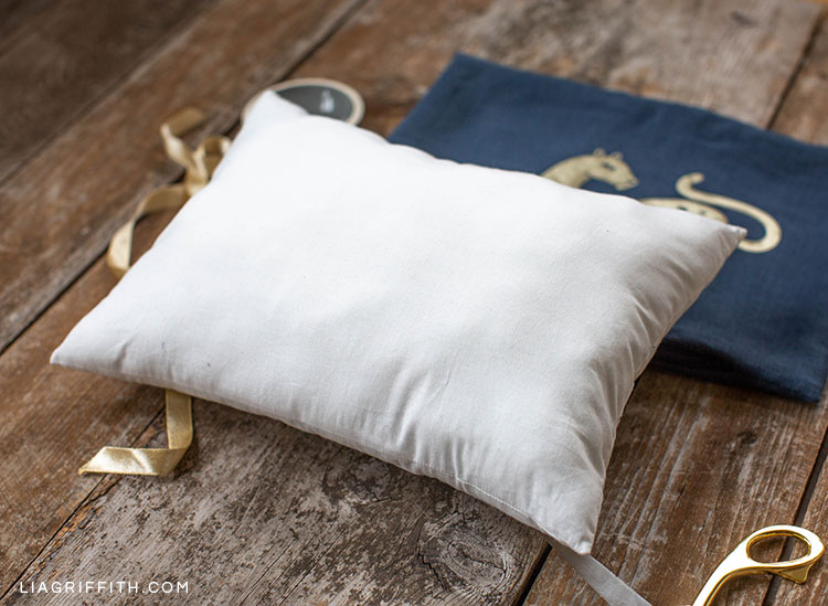 DIY pillowing filling with DIY art deco wild cat pillow cover