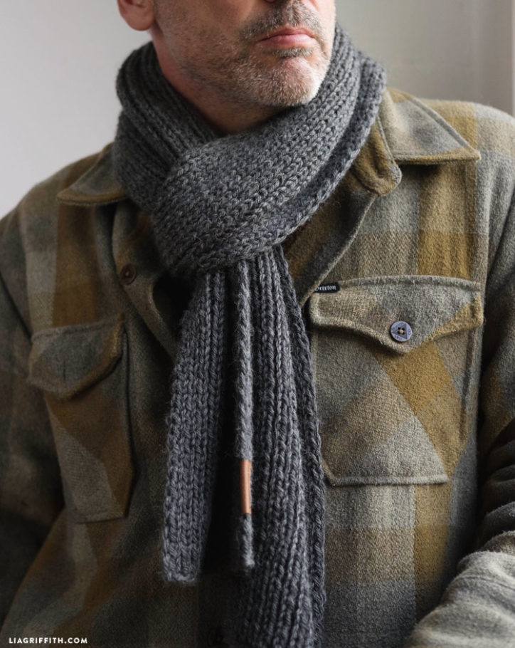 Man wearing wool knit scarf