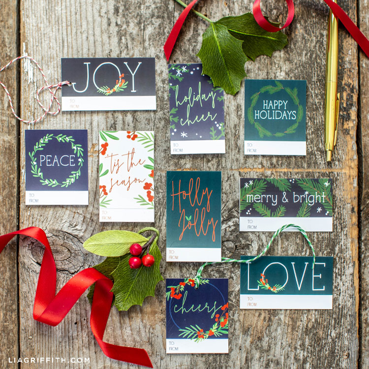 DIY holiday gift tags with winter greens and holly berries