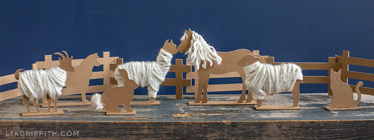 chipboard barnyard animals inside fence and outside fence