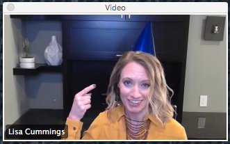 an image showing me wearing a party hat during a virtual training event to celebrate the finish of their leadership cohort