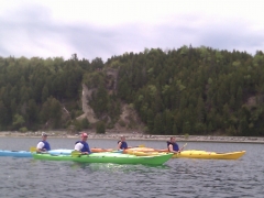 Kayaks in front of Arch Rock