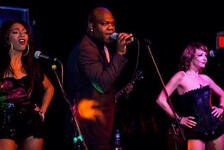 Ace micheals onstage with the girls
