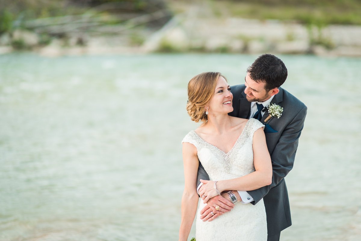 Montesino Ranch Wedding Bride and Groom at Blanco River