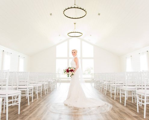 The Farmhouse Bridal Portraits with a white shiplap chapel