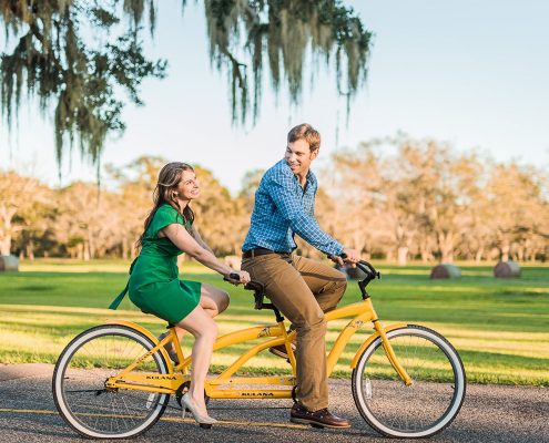 Cute Country Engagement Portrait of Couple on Tandem Bike