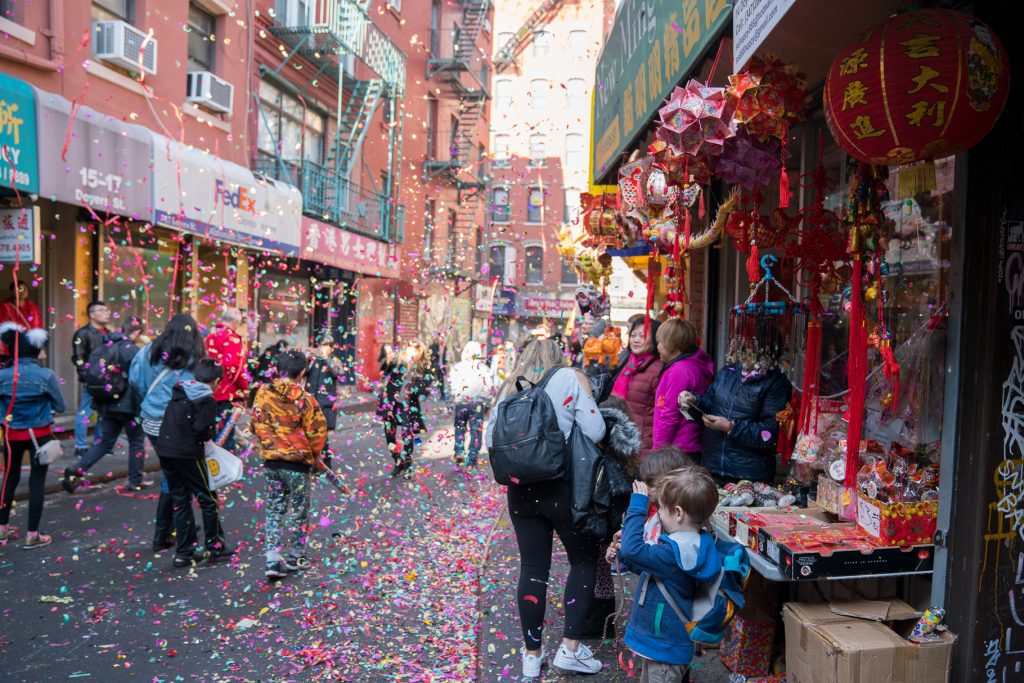 Things to do in NYC with Kids: Confetti in the streets of China Town