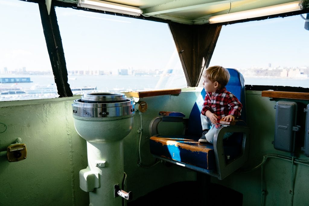 Things to do in NYC with Kids: The Intrepid captain's chair