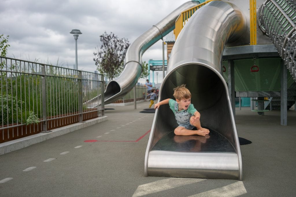 Things to do in NYC with Kids: Fun on the slides at Domino Park