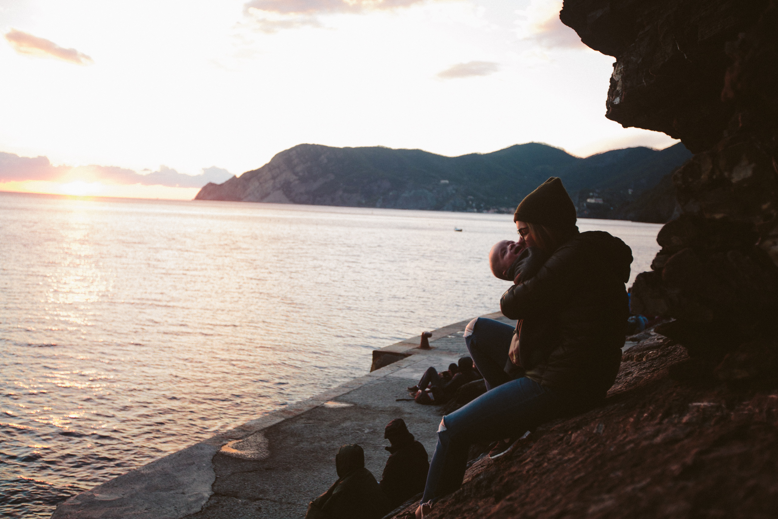 family travel ocean sunset