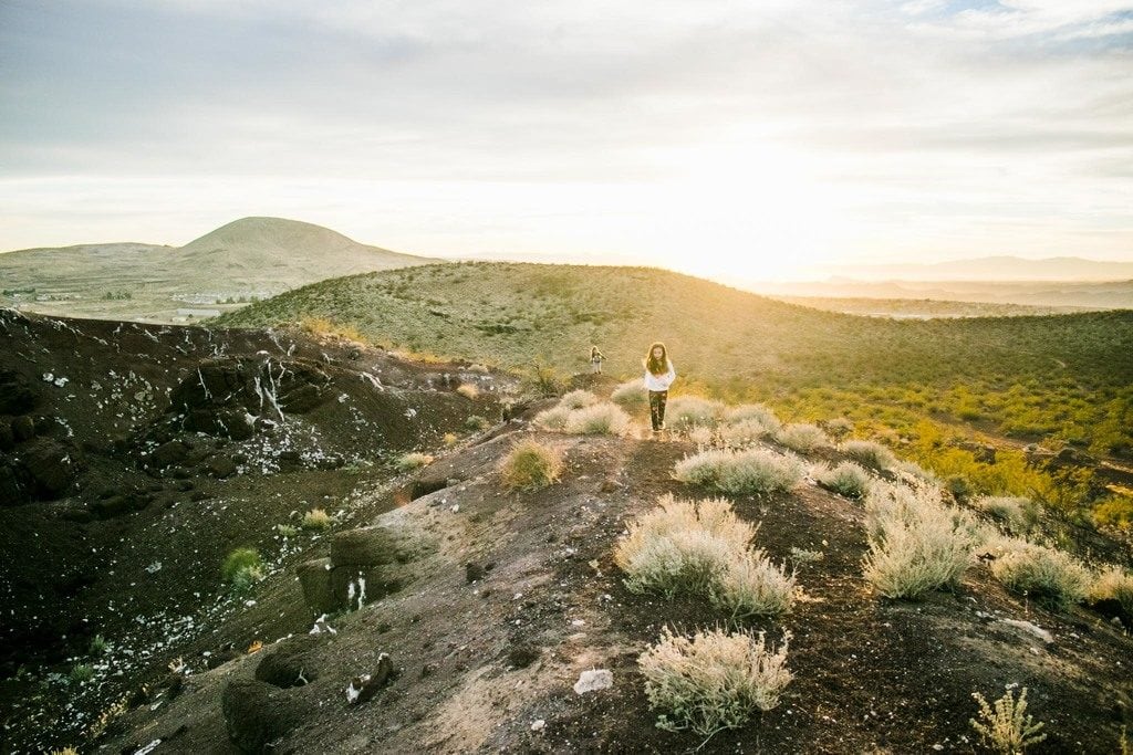 Girl standing in mountains