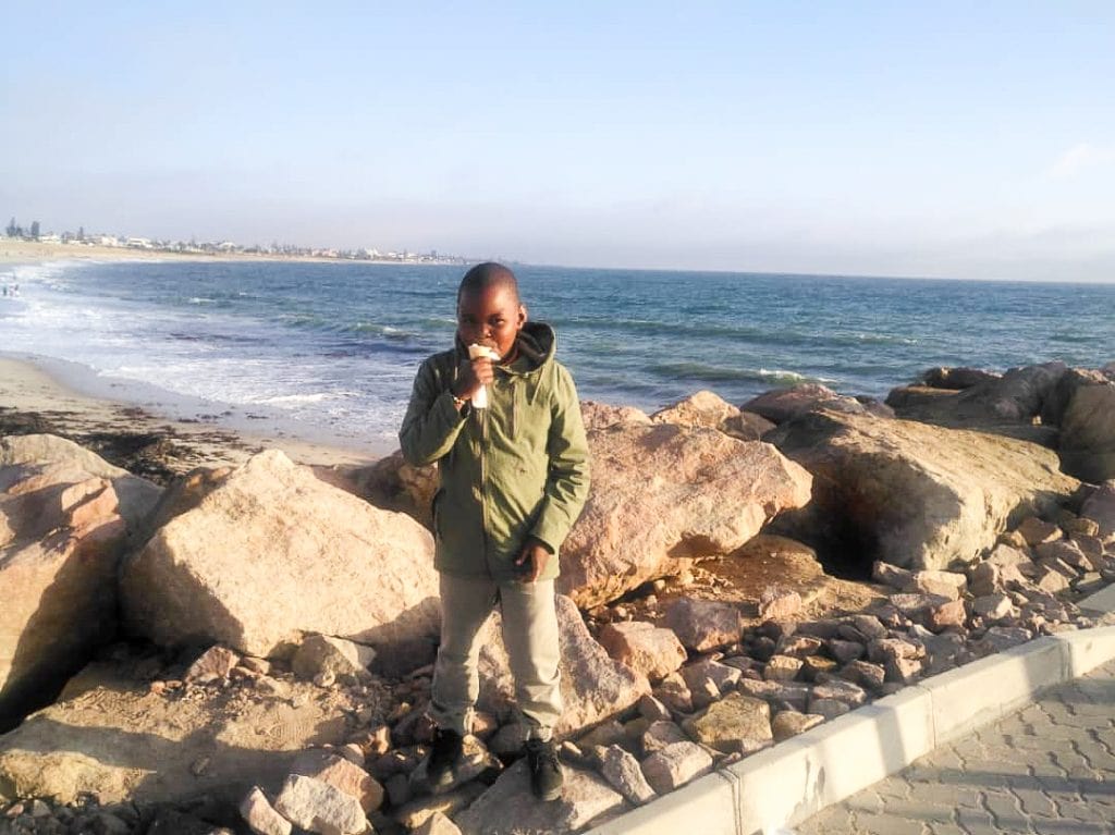 Africa for Kids: Boy at the Beach in Swakopmund