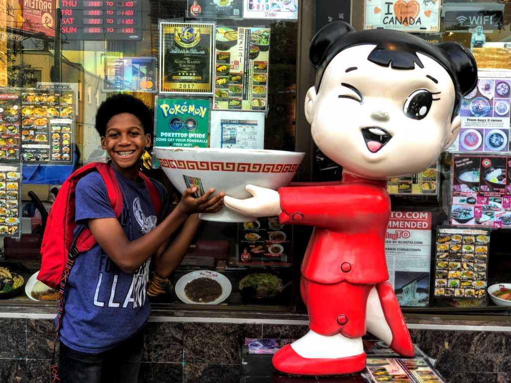 Canada for Kids: Outside a noodle restaurant in Kensington Market