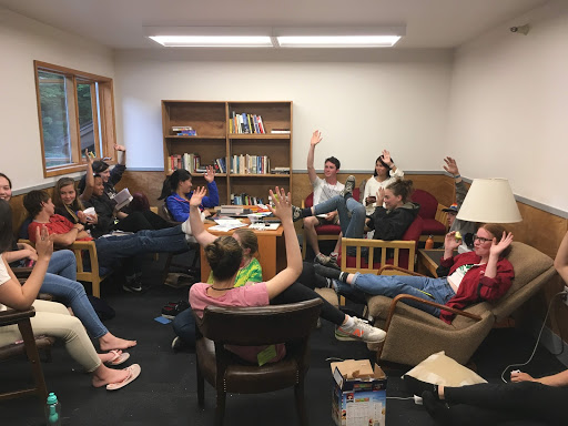 Students engaged in self governance discussion