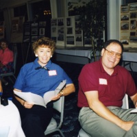 Two White Bluffs reunion attendees seated at banquet table<br />
