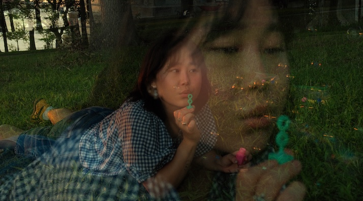 min.a Sings From Inside the Spiral in New Single “guess who”
