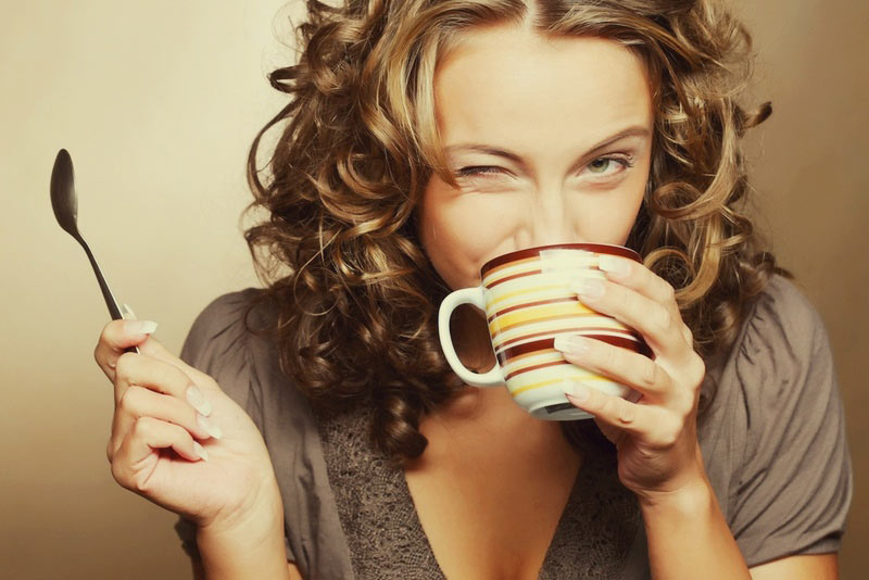 Pretty-woman-drinking-coffee.jpg