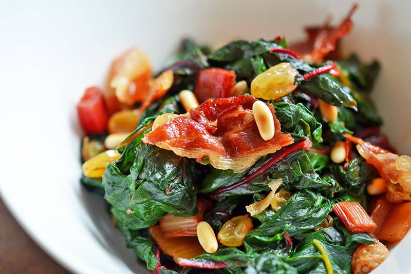 Swiss-Chard-with-Raisins-Pine-Nuts-and-Porkitos.jpg