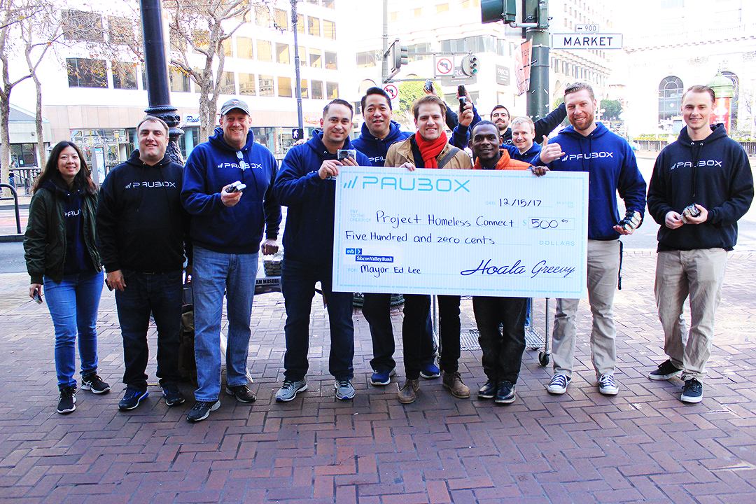Caleb Plakun from Project Homeless Connect joined us for a picture - Paubox
