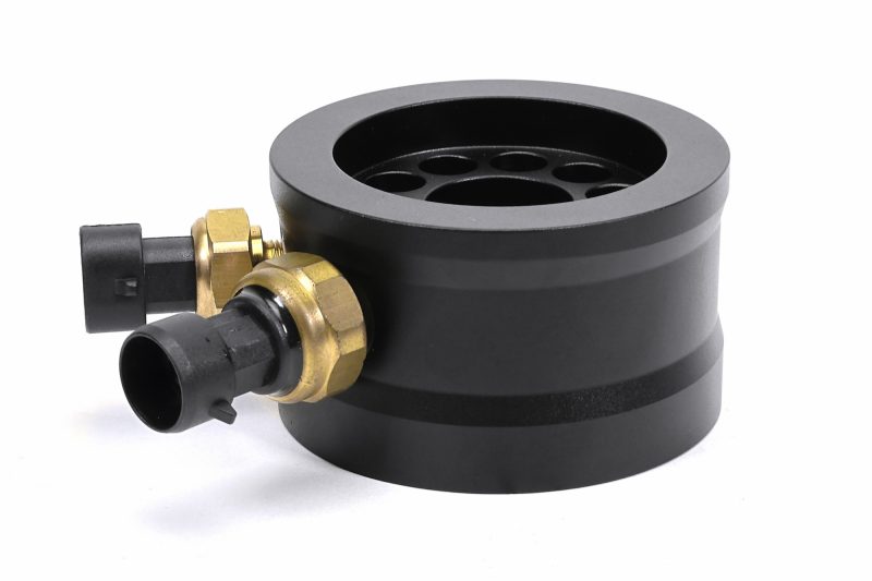 A black PERRIN Oil Temperature Adapter.