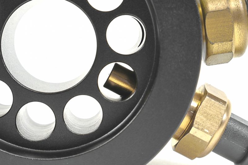 A black PERRIN Oil Temperature Adapter.