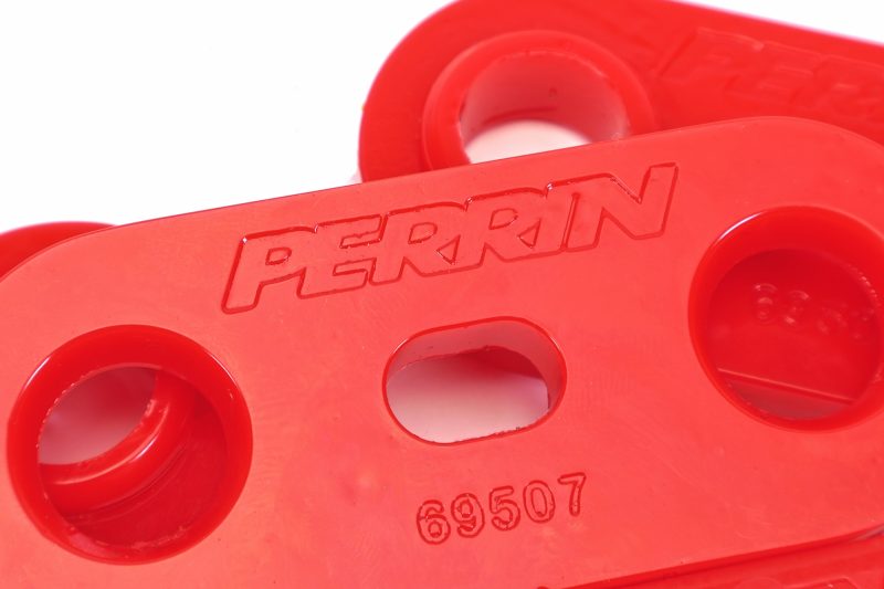 PERRIN Transmission Crossmember Bushings on a white background.