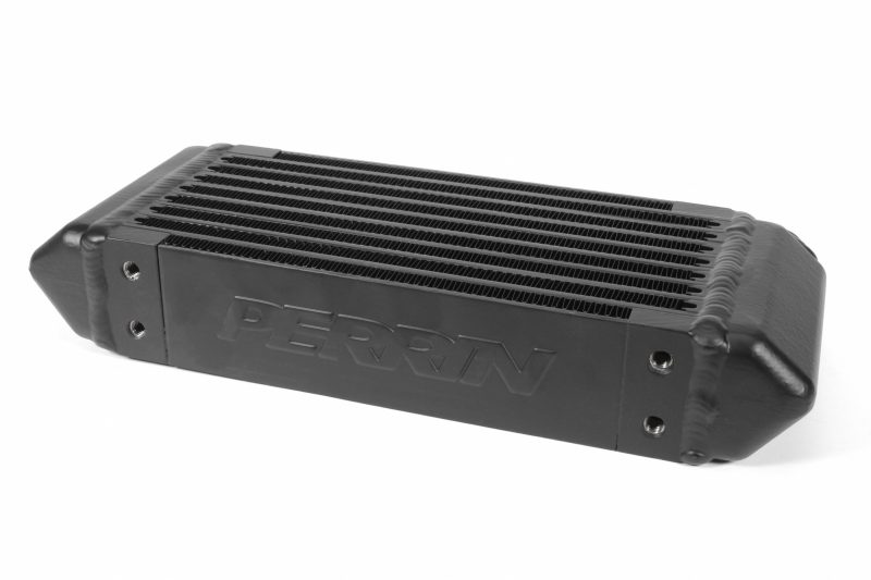 A black PERRIN Transmission Oil Cooler.