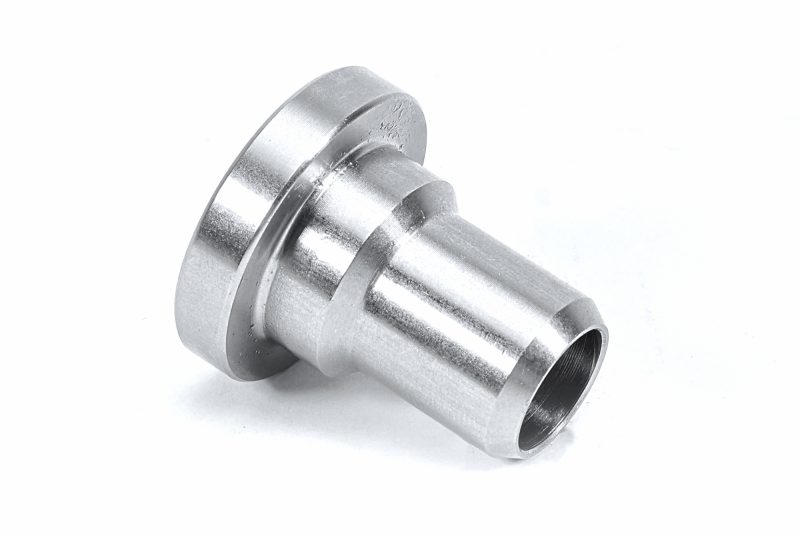 A PERRIN Subframe Lockdown bushing on a white background.