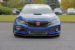 Blue Honda Civic in a parking lot with license plate relocation kit attached
