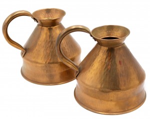 English renaissance style copper pitchers