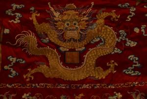 Chinese red silk embroidered wall hanging