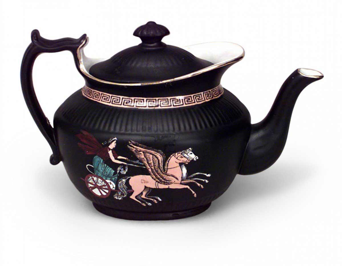 Black porcelain teapot with grecian design