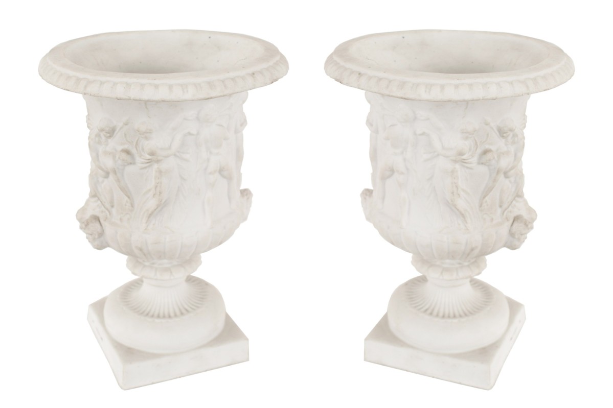 Italian neoclassic style white porcelain urns