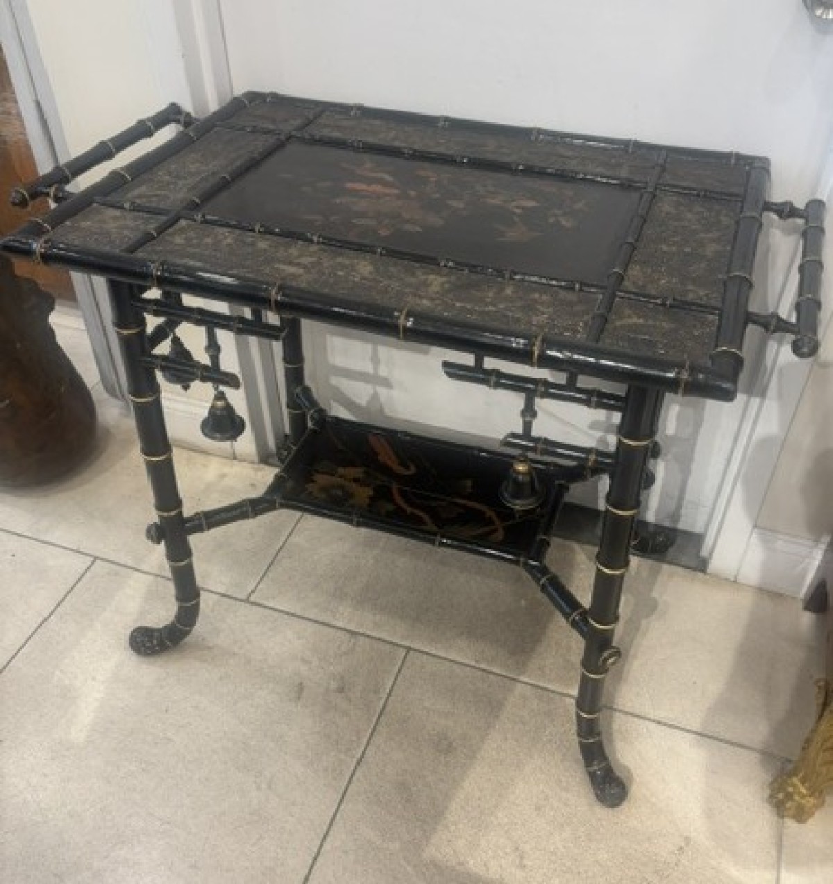 Bamboo table with shelf and bells