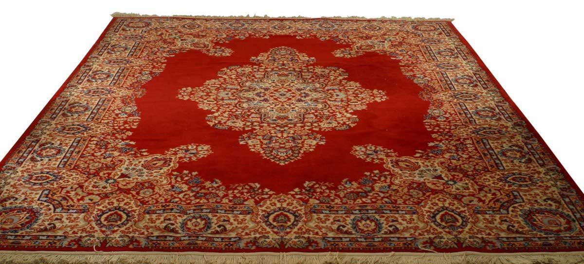 Persian red and beige area rug