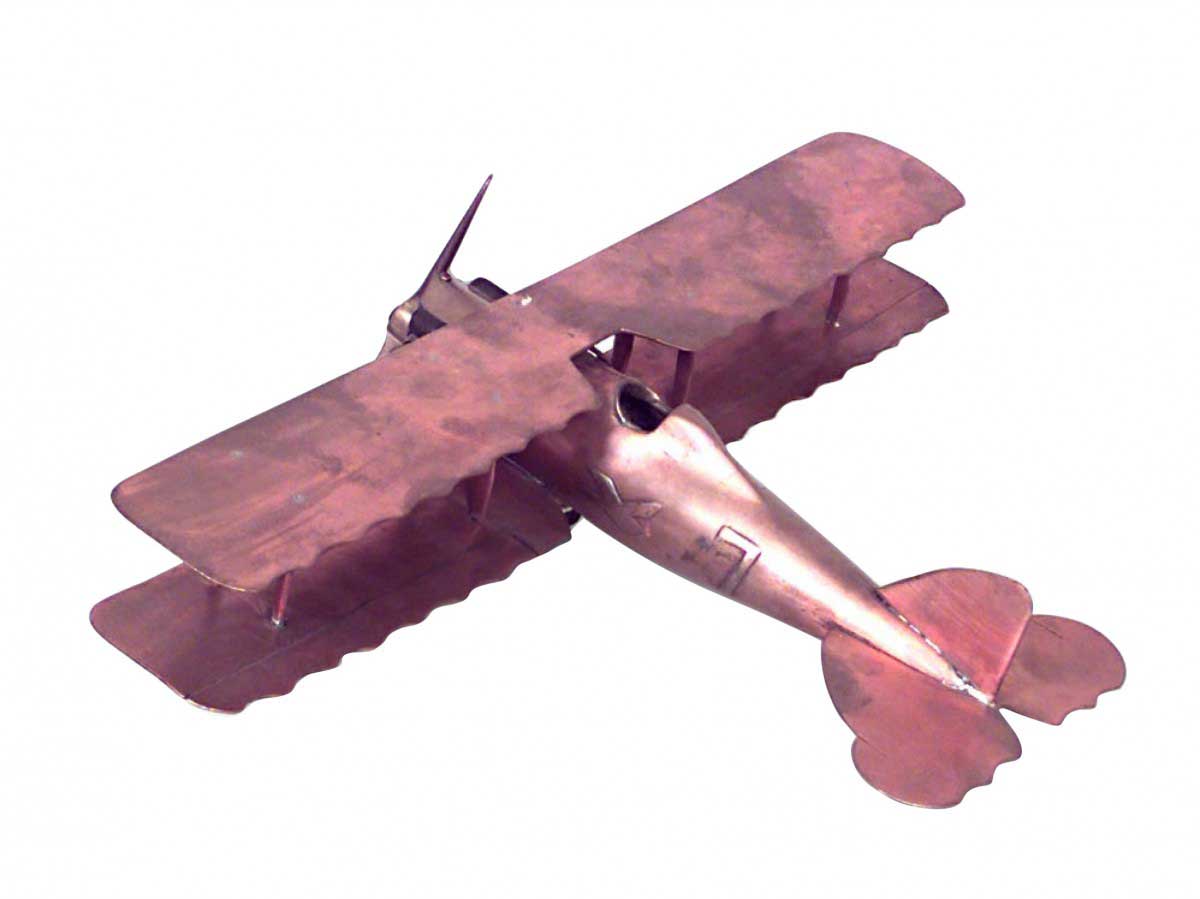 Vintage copper and brass airplane model