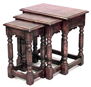 English renaissance style oak nest of tables