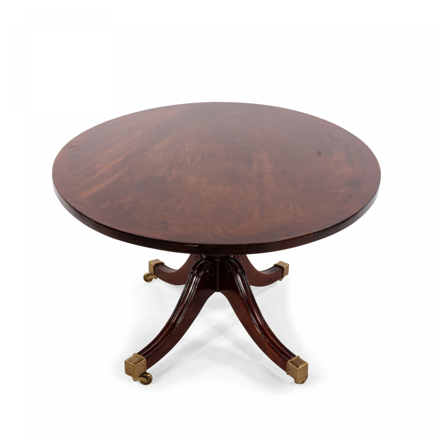 Oval empire style mahogany coffee table with four feet on casters