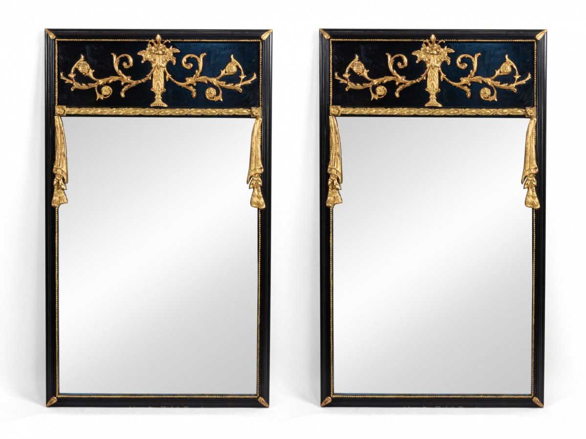 Two rectangular black lacquered mirrors with gold accents