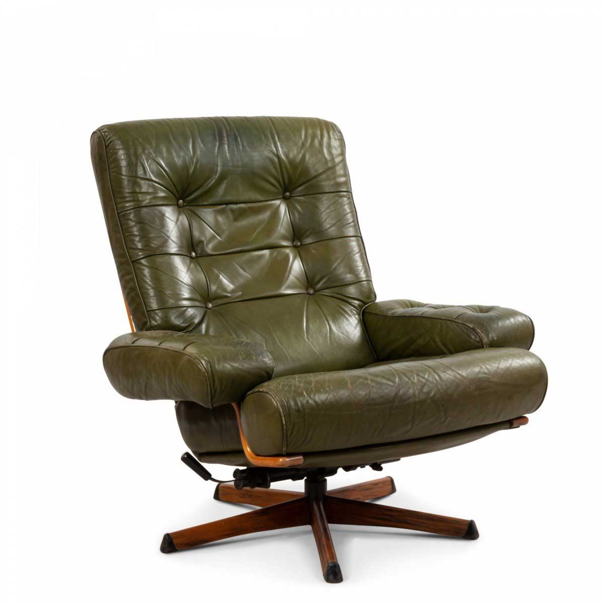 Mid century green tufted leather armchair