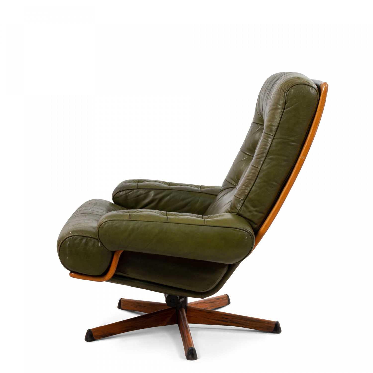 Mid century green tufted leather armchair